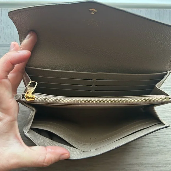 Louis Vuitton Empreinte Sarah Wallet (Color: Turtledove)